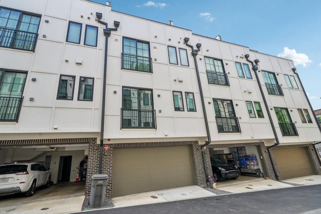 71 Krog St NE, Atlanta, GA 30307 - view of property with an attached garage