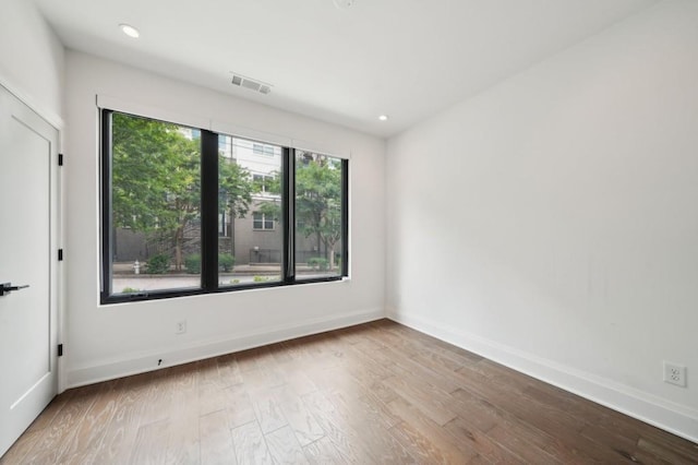 71 Krog St NE, Atlanta, GA 30307 - empty room featuring wood finished floors, recessed lighting, and baseboards