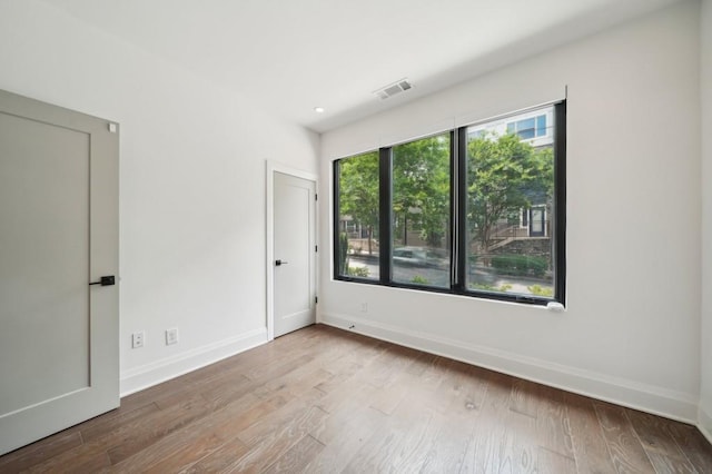 71 Krog St NE, Atlanta, GA 30307 - unfurnished room with baseboards and wood finished floors