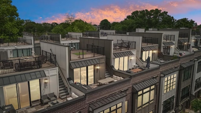71 Krog St NE, Atlanta, GA 30307 - rear view of property featuring a balcony