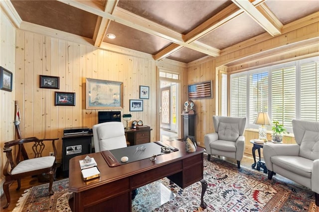 office space featuring crown molding, wood walls, beam ceiling, and coffered ceiling