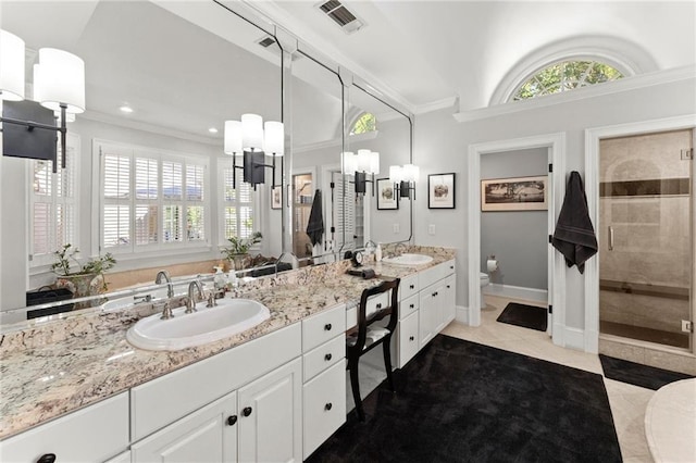 bathroom with tile patterned flooring, visible vents, toilet, a sink, and a stall shower