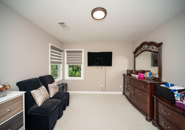 2521 Wood Creek Ct, Dacula, GA 30019 - sitting room with light colored carpet and baseboards