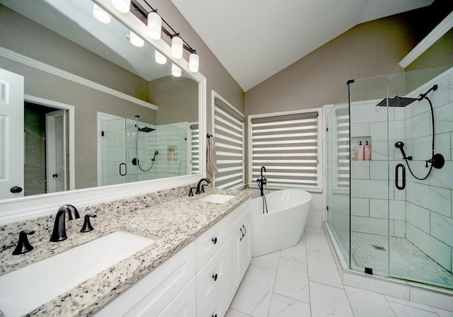 2521 Wood Creek Ct, Dacula, GA 30019 - bathroom featuring a shower stall, lofted ceiling, a soaking tub, marble finish flooring, and double vanity