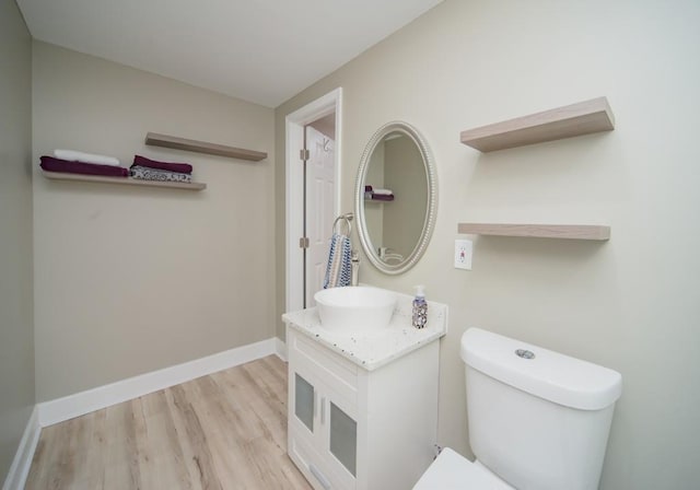 2521 Wood Creek Ct, Dacula, GA 30019 - bathroom featuring wood finished floors and vanity