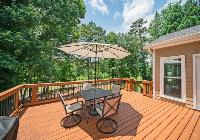 2521 Wood Creek Ct, Dacula, GA 30019 - deck featuring outdoor dining area and view of scattered trees