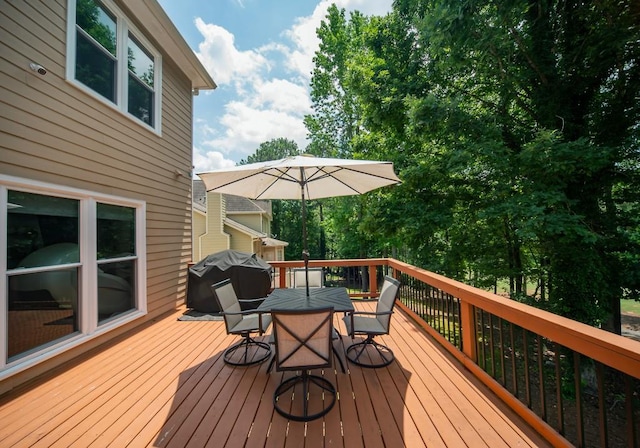 2521 Wood Creek Ct, Dacula, GA 30019 - wooden terrace with outdoor dining area and grilling area