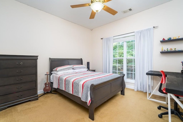 bedroom featuring ceiling fan and light colored carpet