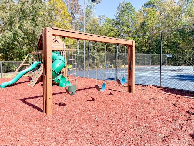 view of playground with tennis court