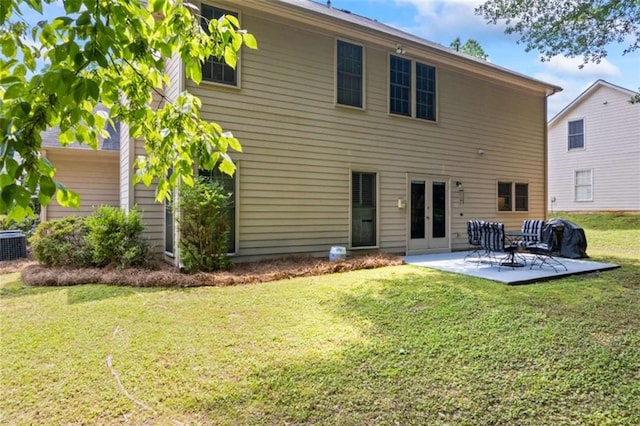 3652 Morning Creek Ct, Suwanee, GA 30024 - back of house with a patio area, a yard, and central AC