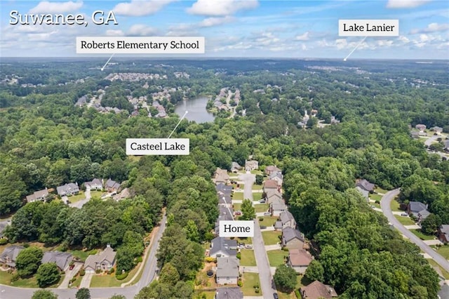 3652 Morning Creek Ct, Suwanee, GA 30024 - aerial view of property's location featuring a heavily wooded area and nearby suburban area