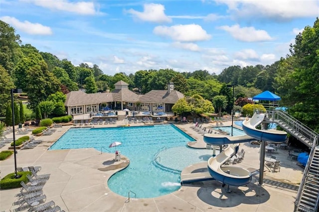 3652 Morning Creek Ct, Suwanee, GA 30024 - community pool with a water slide and a patio