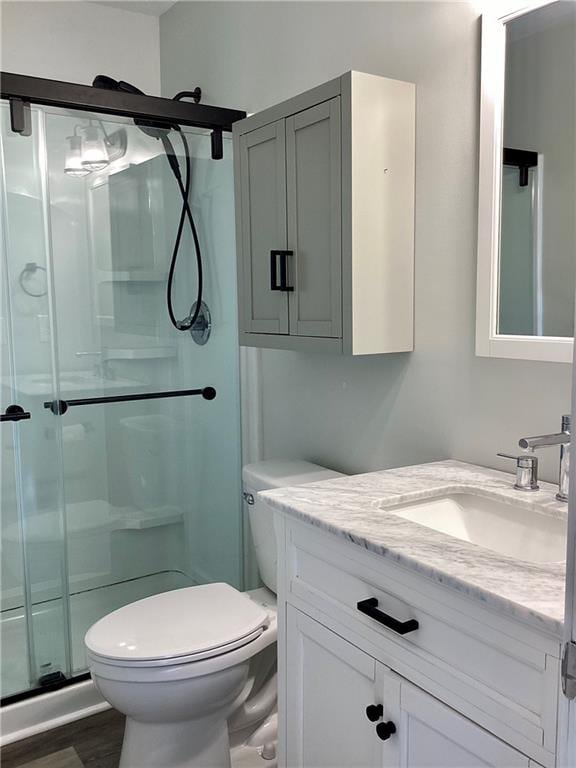 5085 Truman Mountain Rd, Gainesville, GA 30506 - bathroom with vanity, a stall shower, and toilet