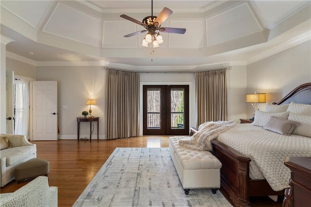 2160 Bradley Trl, Cumming, GA 30041 - bedroom with access to exterior, french doors, coffered ceiling, wood finished floors, and ornamental molding