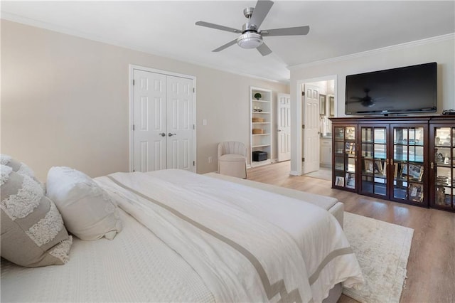 2160 Bradley Trl, Cumming, GA 30041 - bedroom featuring wood finished floors, crown molding, and ceiling fan