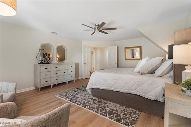 2160 Bradley Trl, Cumming, GA 30041 - bedroom featuring baseboards, wood finished floors, and a ceiling fan