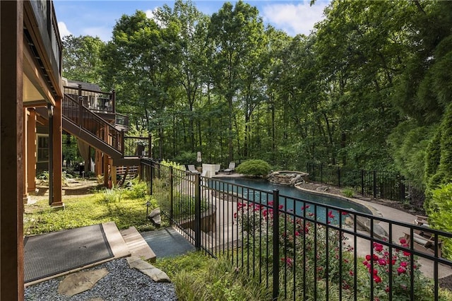 2160 Bradley Trl, Cumming, GA 30041 - view of wooden balcony with stairway, view of pool, and a wooden deck