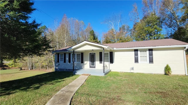 ranch-style home with a porch and a front yard