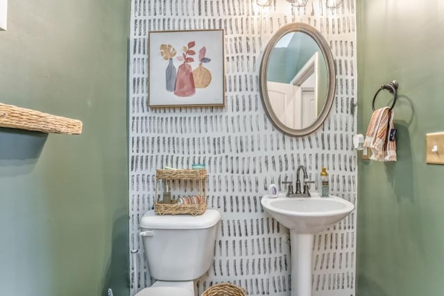 half bathroom with toilet