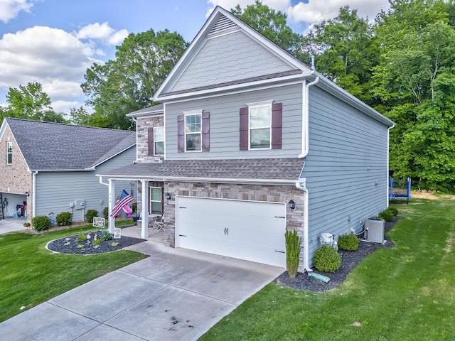 view of front of home featuring an attached garage, central AC unit, stone siding, and a front lawn