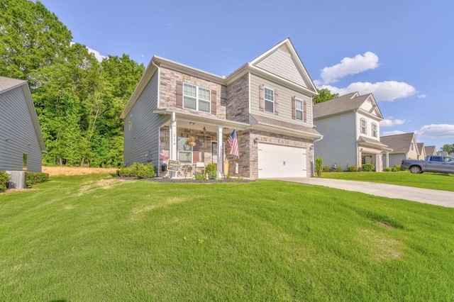 view of front of house with stone siding, a garage, concrete driveway, a front yard, and covered porch