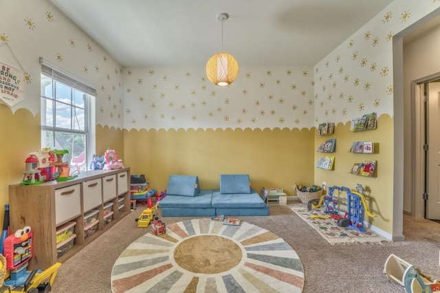 rec room featuring carpet and wallpapered walls
