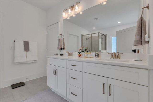 147 Wolf Creek Cv, Lagrange, GA 30240 - full bathroom with a shower stall, double vanity, tile patterned flooring, and recessed lighting
