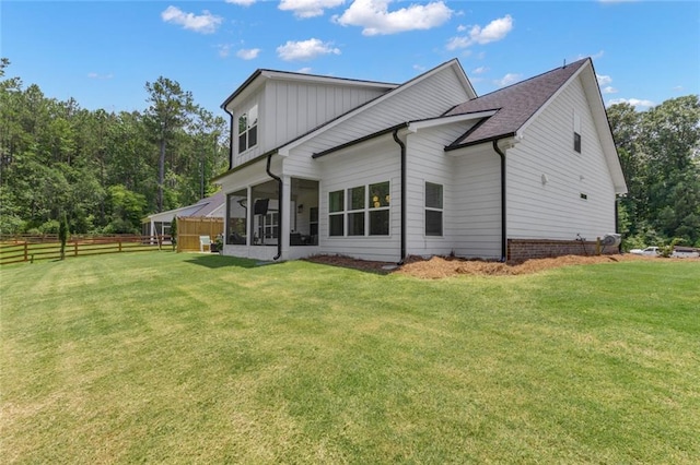 147 Wolf Creek Cv, Lagrange, GA 30240 - back of house featuring a sunroom