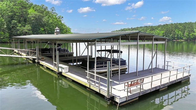 147 Wolf Creek Cv, Lagrange, GA 30240 - dock area featuring a water view, boat lift, and a forest view