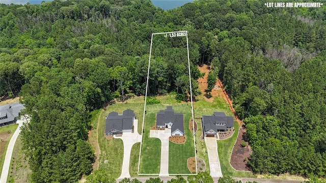 147 Wolf Creek Cv, Lagrange, GA 30240 - aerial overview of property's location featuring a forest and property boundaries highlighted