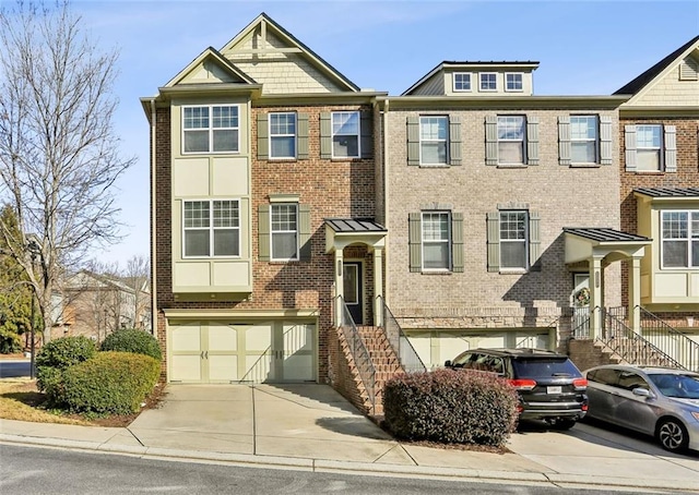 townhome / multi-family property featuring a garage