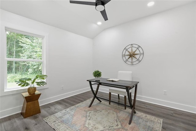 office featuring dark hardwood / wood-style floors, a healthy amount of sunlight, and vaulted ceiling