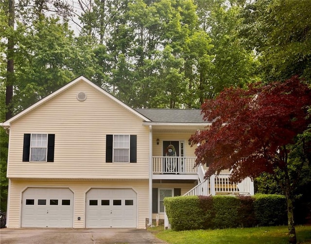 1043 Foxhollow Trl, Canton, GA 30115 - view of front of property with a garage, driveway, and stairway