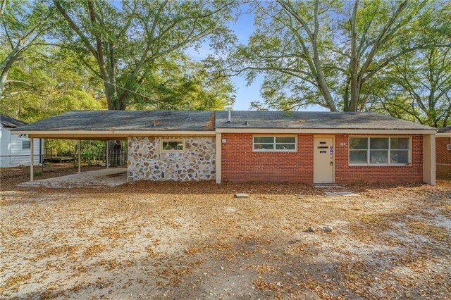 exterior space featuring a carport