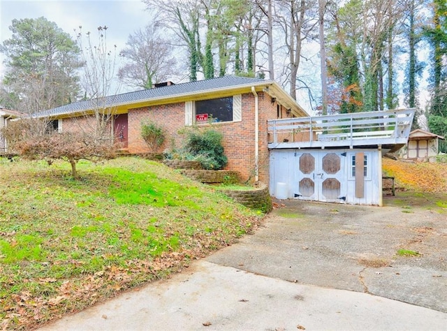 view of home's exterior with an outdoor structure