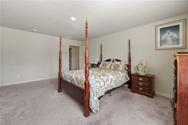 bedroom featuring light colored carpet