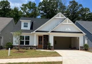 394 Maple View Dr, Carrollton, GA 30117 - view of front of house with a garage, concrete driveway, and a front lawn