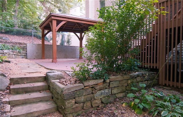 view of yard featuring a gazebo, a patio area, and fence