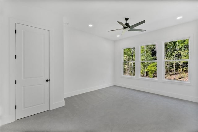 carpeted empty room featuring recessed lighting, baseboards, and ceiling fan