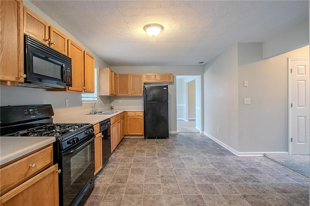 6181 E Fayetteville Dr, Riverdale, GA 30296 - kitchen with black appliances, light countertops, and a textured ceiling