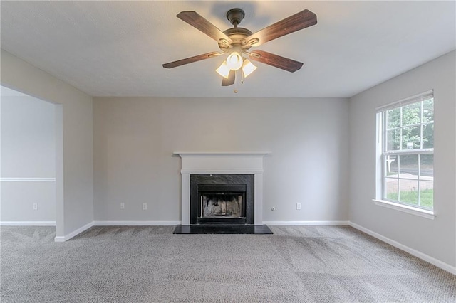6181 E Fayetteville Dr, Riverdale, GA 30296 - unfurnished living room with carpet, a premium fireplace, and ceiling fan