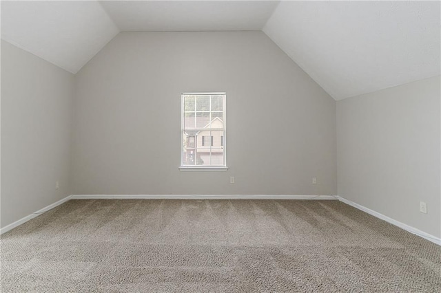 6181 E Fayetteville Dr, Riverdale, GA 30296 - additional living space featuring vaulted ceiling and carpet