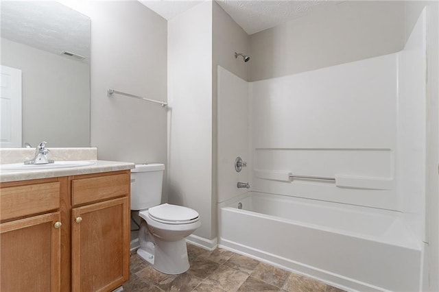 6181 E Fayetteville Dr, Riverdale, GA 30296 - bathroom with  shower combination, vanity, and a textured ceiling
