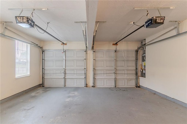 6181 E Fayetteville Dr, Riverdale, GA 30296 - garage featuring a garage door opener