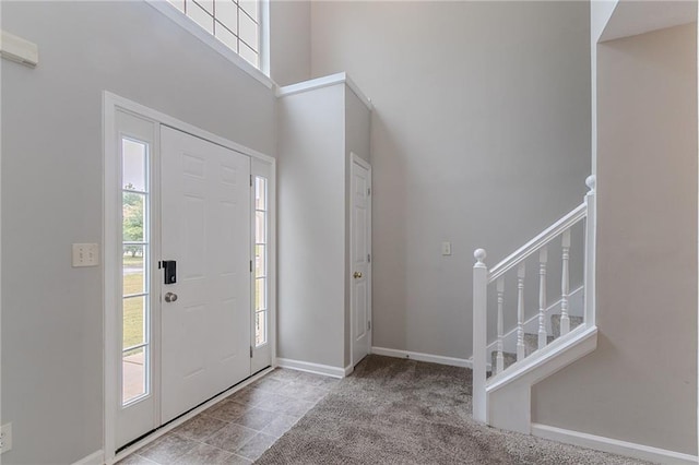 6181 E Fayetteville Dr, Riverdale, GA 30296 - entrance foyer with stairs and carpet floors