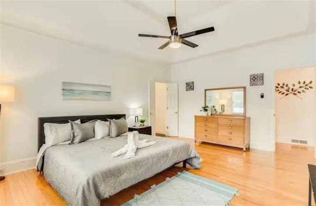 bedroom featuring ceiling fan and wood finished floors