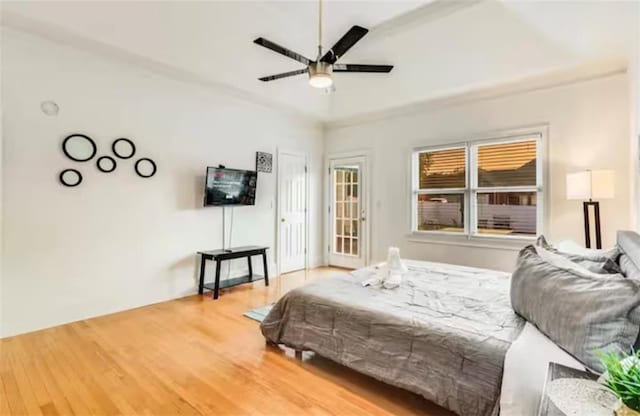 bedroom featuring ceiling fan and wood finished floors