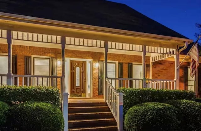 property entrance with a porch