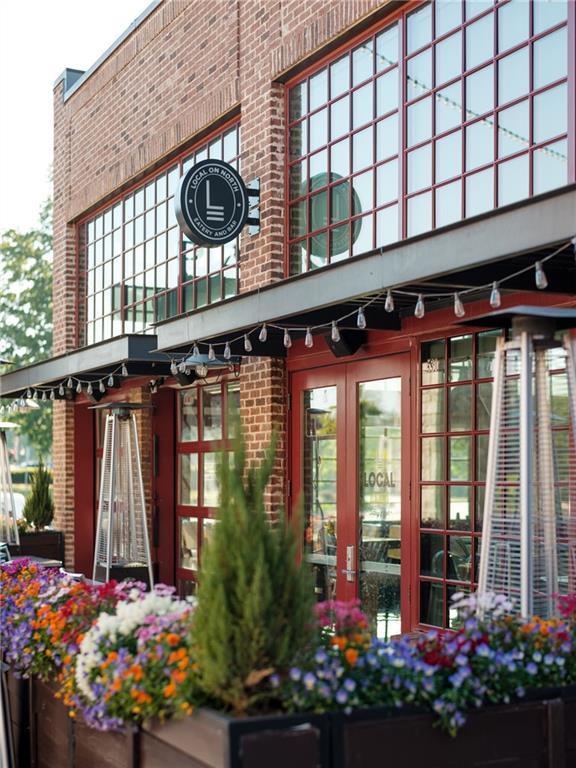 exterior space featuring brick siding