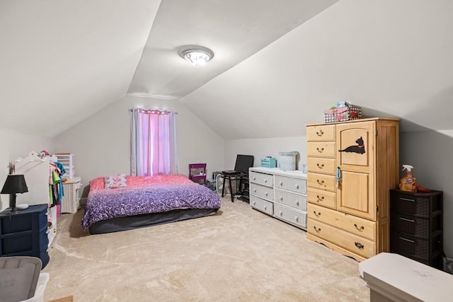 carpeted bedroom featuring vaulted ceiling